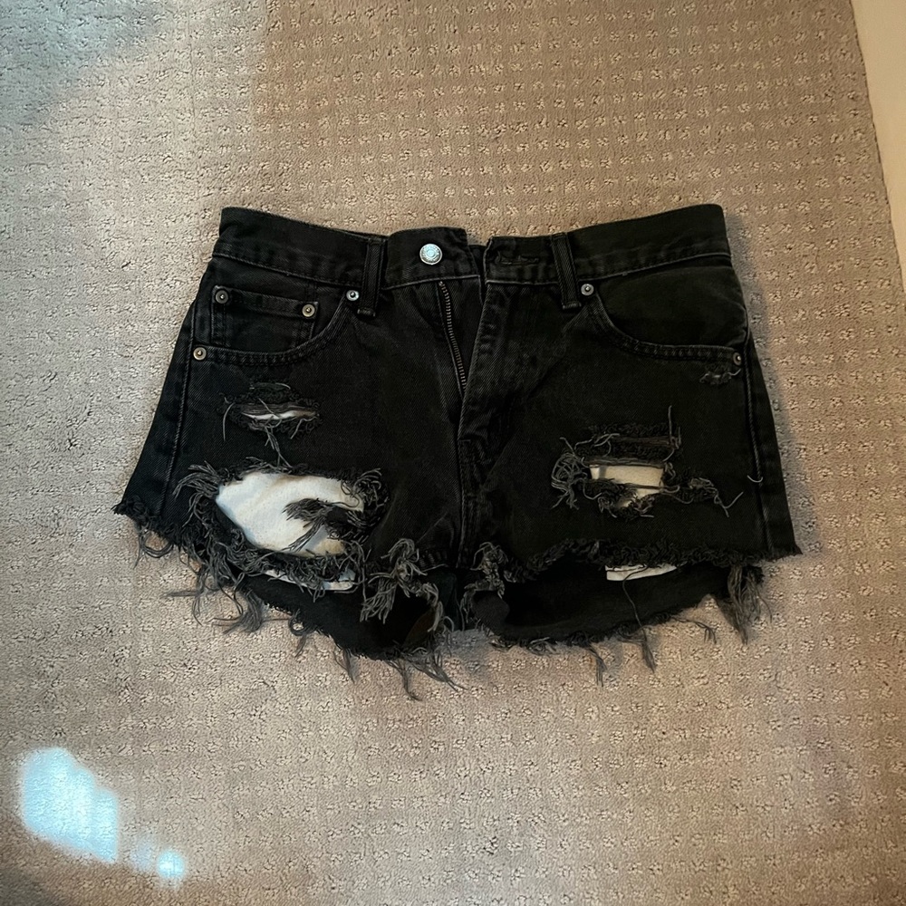 Black ripped Levi jean shorts, size 29